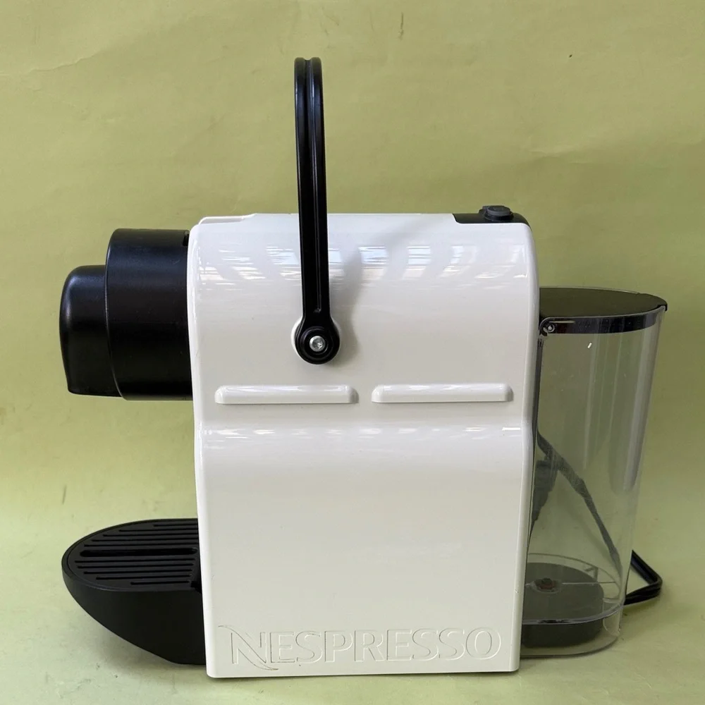 Nespresso White and Black Coffee Maker